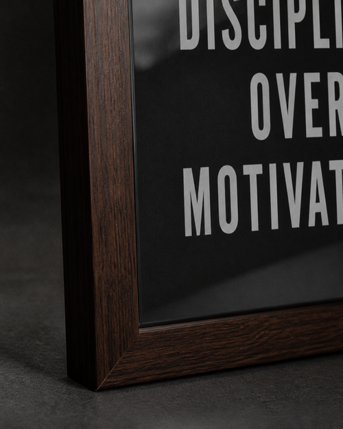 Discipline Over Motivation — Walnut Framed Print
